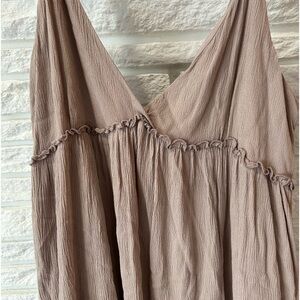 Super cute, mini beige tiered, lined dress size L never worn.